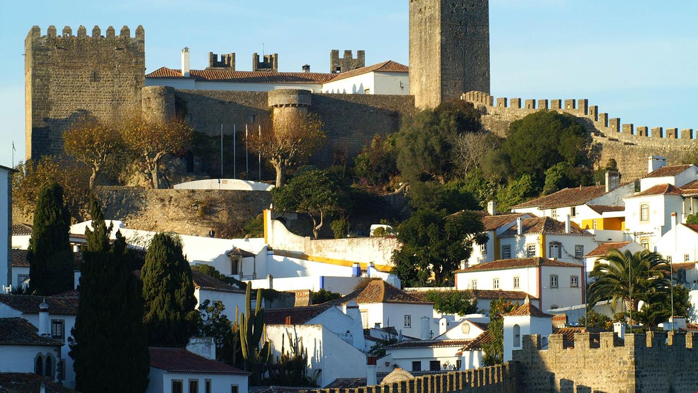 Het oude kasteel dat binnen de muren ligt herbergt nu een van de intiemste pousadas van Portugal, Castelo de Obidos. Foto: Visit Centro de Portugal.